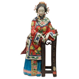 Chinese Porcelain Figurine, Shi Wan Lady in Red Leaning on Pedestal